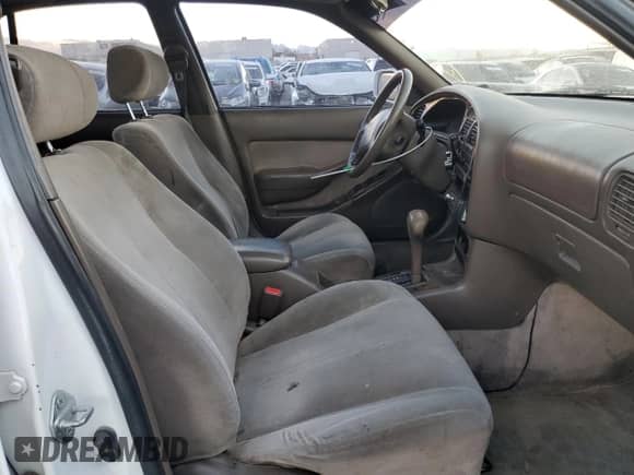 1995 Toyota Camry XLE с VIN JT2GK13E8S0123840, выставлен на аукционе Copart как лот 86379784 с пробегом 276 387 миль миль и Списание • Salvage title. История ставок и продаж доступна на DreamBid. Изображение 5.