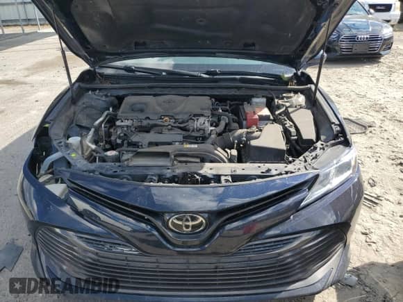 2019 Toyota Camry LE с VIN 4T1B11HK6KU842124, выставлен на аукционе Copart как лот 83793575 с пробегом 194 095 миль миль и Списание • Salvage title. История ставок и продаж доступна на DreamBid. Изображение 11.