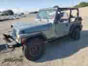 1998 Jeep Wrangler SE z VIN 1J4FY29P0WP758526, wystawiony jako Copart lot #70364935 z przebiegiem 126 356 mil mil oraz Szkoda całkowita • Salvage title. Historia ofert i sprzedaży dostępna na DreamBid. Obrazek 1.