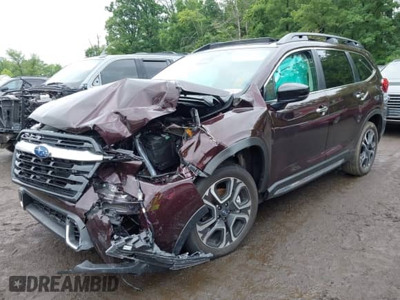 2024 Subaru Ascent Touring with VIN 4S4WMAWD5R3461085, listed as a IAAI auction lot 42364309 with 5,683 mi miles and . Bid and sale history available at DreamBid. Image 2.