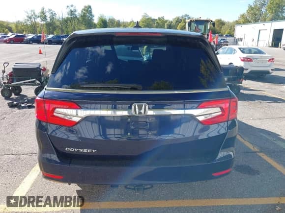 2019 Honda Odyssey EX-L with VIN 5FNRL6H76KB054460, listed as a IAAI auction lot 43404528 with 96,987 mi miles and . Bid and sale history available at DreamBid. Image 17.