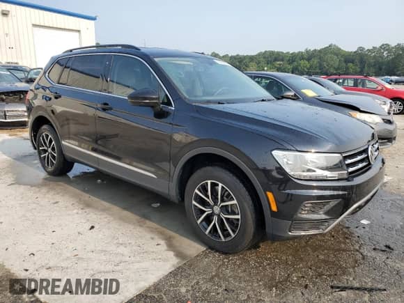 2021 Volkswagen Tiguan SE с VIN 3VV3B7AXXMM070041, выставлен на аукционе Copart как лот 59256655 с пробегом 57 474 миль миль и Списание • Salvage title. История ставок и продаж доступна на DreamBid. Изображение 4.