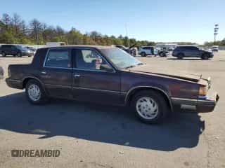 1989 Dodge Dynasty с VIN 1B3BC4637KD532206, выставлен на аукционе Copart как лот 74233744 с пробегом 85 245 миль миль и Чистый • Clean title. История ставок и продаж доступна на DreamBid. Изображение 4.