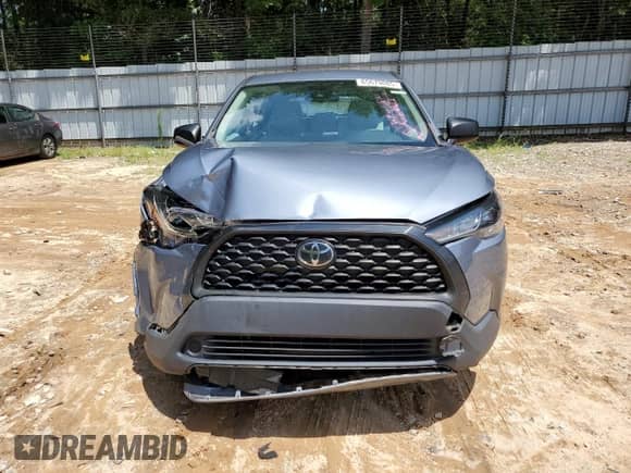 2022 Toyota Corolla Cross L with VIN 7MUAAAAG5NV025036, listed as a Copart auction lot 65679085 with 45,615 mi miles and Salvage title. Bid and sale history available at DreamBid. Image 5.