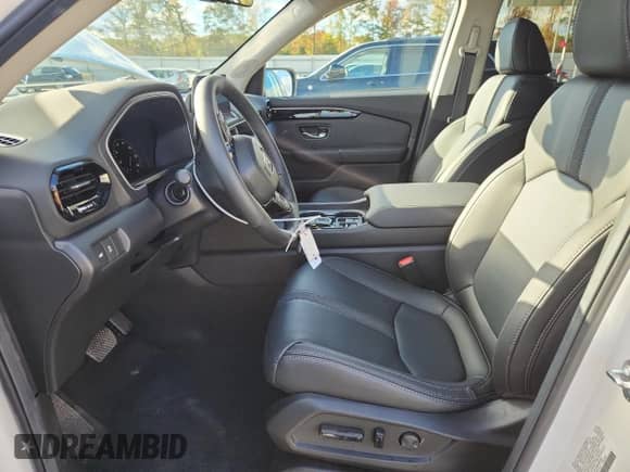 2025 Honda Pilot Touring z VIN 5FNYG1H72SB131215, wystawiony jako Copart lot #91088055 z przebiegiem 2 925 mil mil oraz Szkoda całkowita • Salvage title. Historia ofert i sprzedaży dostępna na DreamBid. Obrazek 7.