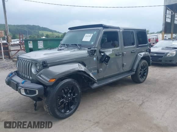 2022 Jeep Wrangler Unlimited Sahara with VIN 1C4JJXP64NW232223, listed as a IAAI auction lot 42641049 with 32,903 mi miles and . Bid and sale history available at DreamBid. Image 18.
