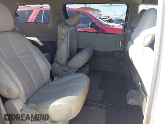 2013 Toyota Sienna XLE AAS with VIN 5TDYK3DC6DS372819, listed as a IAAI auction lot 41395777 with 181,526 mi miles and . Bid and sale history available at DreamBid. Image 8.