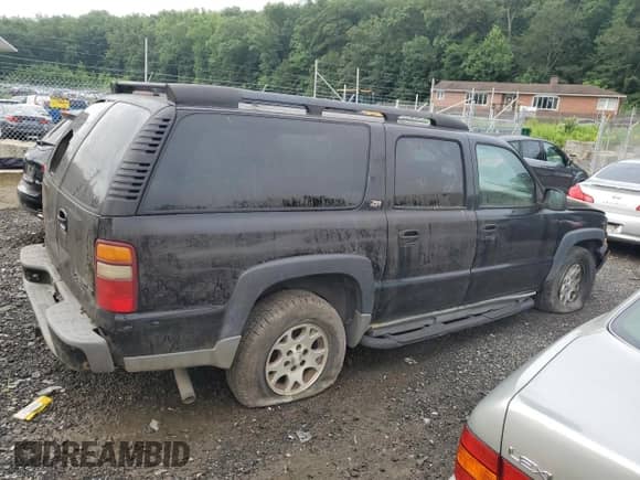 2002 Chevrolet Suburban Z71 z VIN 3GNFK16Z62G272218, wystawiony jako Copart lot #64373275 z przebiegiem 369 241 mil mil oraz Szkoda całkowita • Salvage title. Historia ofert i sprzedaży dostępna na DreamBid. Obrazek 3.