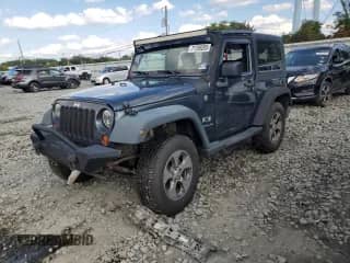 2008 Jeep Wrangler X z VIN 1J4FA24188L560794, wystawiony jako Copart lot #71786095 z przebiegiem 168 730 mil mil oraz Szkoda całkowita • Salvage title. Historia ofert i sprzedaży dostępna na DreamBid. Obrazek 1.