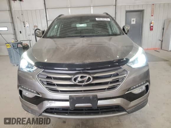 2018 Hyundai Santa Fe 2.0T с VIN 5NMZUDLA0JH060451, выставлен на аукционе Copart как лот 49518715 с пробегом 85 043 миль миль и Списание • Salvage title. История ставок и продаж доступна на DreamBid. Изображение 5.