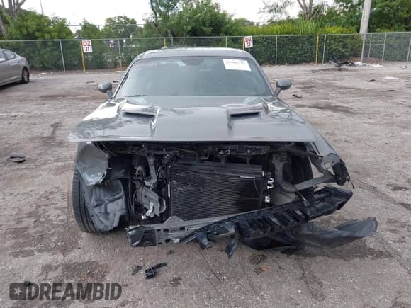 2018 Dodge Challenger T/A with VIN 2C3CDZBTXJH311594, listed as a IAAI auction lot 43202742 with 76,854 mi miles and . Bid and sale history available at DreamBid. Image 12.