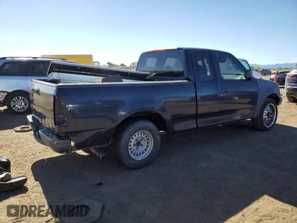 1999 Ford F-150 с VIN 1FTRX17W2XNB71414, выставлен на аукционе Copart как лот 86872795 с пробегом Не указан миль и Чистый • Clean title. История ставок и продаж доступна на DreamBid. Изображение 3.