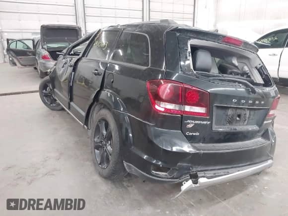 2018 Dodge Journey Crossroad z VIN 3C4PDDGG2JT467079, wystawiony jako IAAI lot #43113665 z przebiegiem 75 469 mil mil oraz . Historia ofert i sprzedaży dostępna na DreamBid. Obrazek 3.