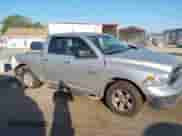 2018 Ram 1500 SLT with VIN 1C6RR6GG2JS119281, listed as a IAAI auction lot 41897492 with 242,877 mi miles and . Bid and sale history available at DreamBid. Image 13.