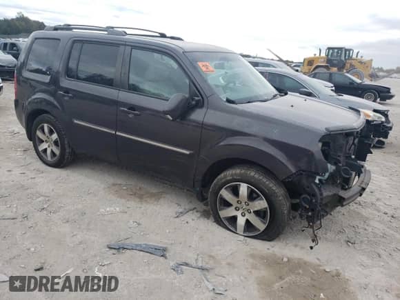 2014 Honda Pilot Touring with VIN 5FNYF4H92EB052430, listed as a Copart auction lot 85482875 with 233,599 mi miles and Salvage title. Bid and sale history available at DreamBid. Image 4.