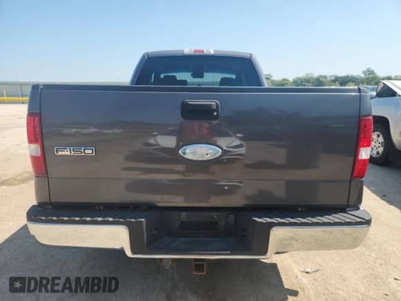2007 Ford F-150 XL with VIN 1FTPX12V67KB02975, listed as a Copart auction lot 80307185 with 129,442 mi miles and Salvage title. Bid and sale history available at DreamBid. Image 6.