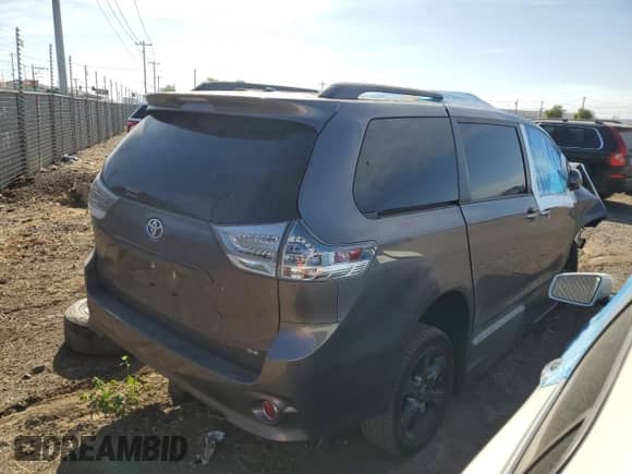 2015 Toyota Sienna SE with VIN 5TDXK3DC5FS642718, listed as a Copart auction lot 57339825 with 66,969 mi miles and Salvage title. Bid and sale history available at DreamBid. Image 3.