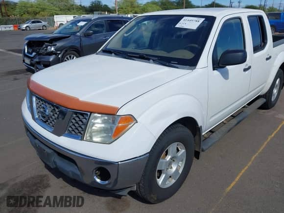 2006 Nissan Frontier LE with VIN 1N6AD07U66C423493, listed as a IAAI auction lot 41449788 with 155,105 mi miles and . Bid and sale history available at DreamBid. Image 6.