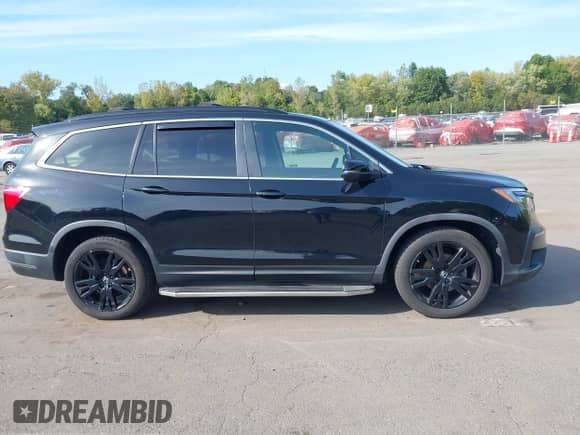 2021 Honda Pilot Special Edition with VIN 5FNYF6H22MB015925, listed as a IAAI auction lot 43332390 with 77,152 mi miles and . Bid and sale history available at DreamBid. Image 13.