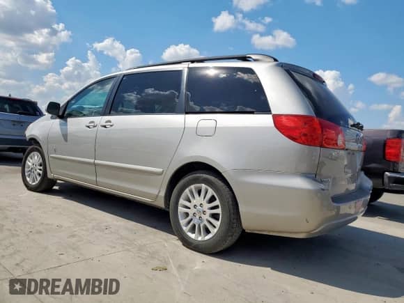 2010 Toyota Sienna XLE с VIN 5TDYK4CC9AS342491, выставлен на аукционе Copart как лот 84887455 с пробегом 241 451 миль миль и Списание • Salvage title. История ставок и продаж доступна на DreamBid. Изображение 2.