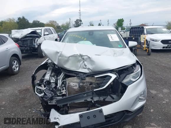 2021 Chevrolet Equinox LT with VIN 3GNAXTEV2MS143317, listed as a IAAI auction lot 41998639 with 85,097 mi miles and . Bid and sale history available at DreamBid. Image 13.
