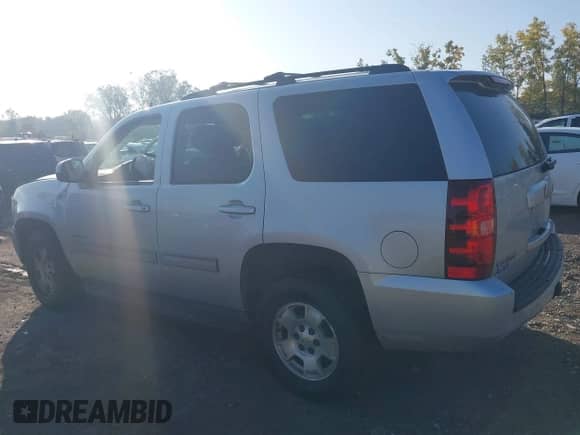 2013 Chevrolet Tahoe LS with VIN 1GNSKAE02DR285441, listed as a IAAI auction lot 43303869 with 230,513 mi miles and . Bid and sale history available at DreamBid. Image 14.