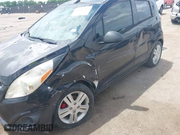 2013 Chevrolet Spark LT z VIN KL8CD6S95DC607864, wystawiony jako IAAI lot #42618384 z przebiegiem 145 617 mil mil oraz . Historia ofert i sprzedaży dostępna na DreamBid. Obrazek 12.