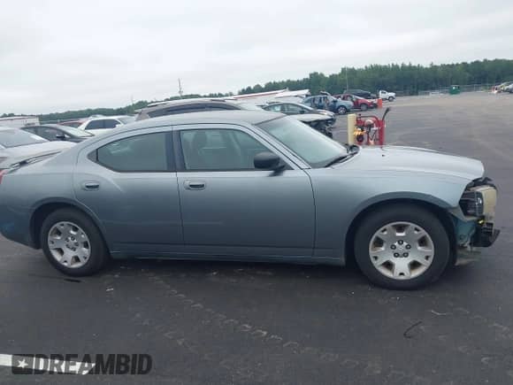 2007 Dodge Charger with VIN 2B3KA43R37H786231, listed as a IAAI auction lot 42946693 with 140,922 mi miles and . Bid and sale history available at DreamBid. Image 14.