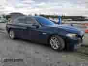 2015 BMW 5 Series 528i xDrive with VIN WBA5A7C54FD627219, listed as a Copart auction lot 84784345 with 112,003 mi miles and Clean title. Bid and sale history available at DreamBid. Image 4.