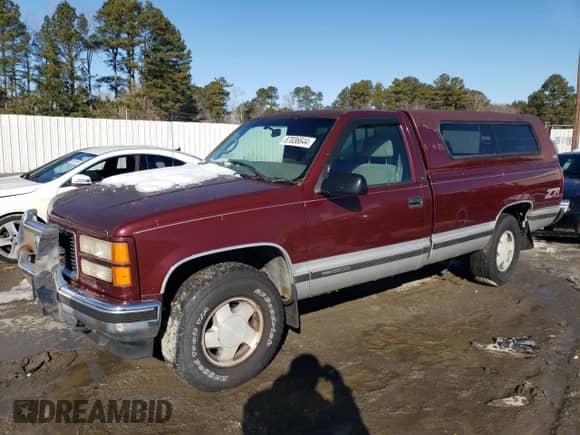 1997 GMC Sierra 1500 z VIN 1GTEK14R3VZ506326, wystawiony jako Copart lot #87036644 z przebiegiem 212 945 mil mil oraz Czysty tytuł • Clean title. Historia ofert i sprzedaży dostępna na DreamBid. Obrazek 1.