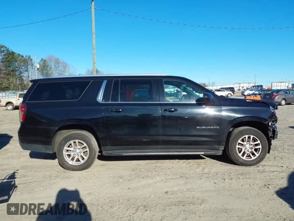 2021 Chevrolet Suburban LT z VIN 1GNSCCKD0MR195186, wystawiony jako IAAI lot #41621859 z przebiegiem 129 691 mil mil oraz . Historia ofert i sprzedaży dostępna na DreamBid. Obrazek 13.