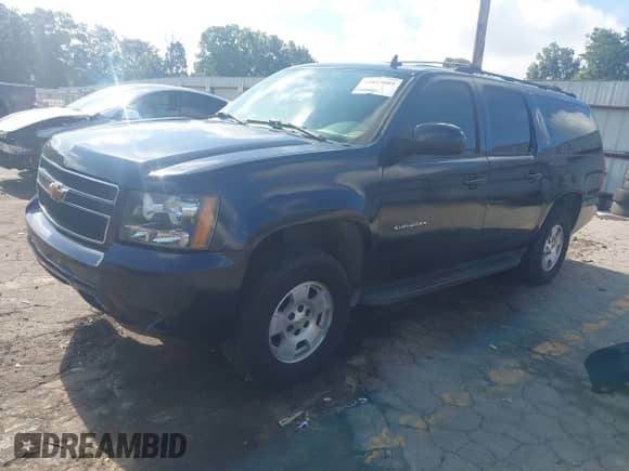 2007 Chevrolet Suburban LT with VIN 1GNFC16077J244819, listed as a IAAI auction lot 42823003 with 186,301 mi miles and . Bid and sale history available at DreamBid. Image 17.