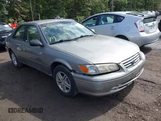 2000 Toyota Camry CE z VIN JT2BG22K8Y0410919, wystawiony jako IAAI lot #43198945 z przebiegiem 183 150 mil mil oraz . Historia ofert i sprzedaży dostępna na DreamBid. Obrazek 1.