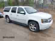 2014 Chevrolet Suburban LTZ with VIN 1GNSKKE77ER152002, listed as a IAAI auction lot 41930865 with 159,393 mi miles and . Bid and sale history available at DreamBid. Image 1.
