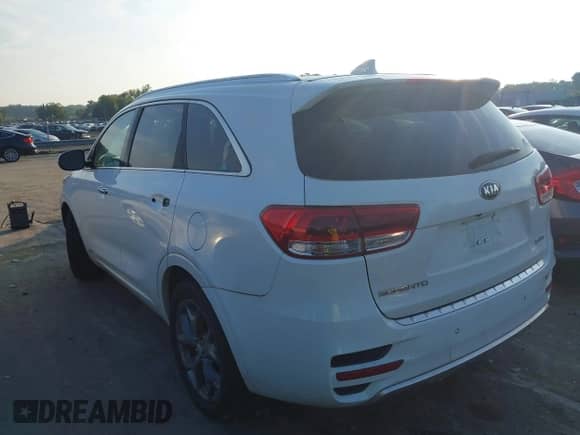 2016 Kia Sorento SXL z VIN 5XYPKDA57GG146717, wystawiony jako IAAI lot #43018518 z przebiegiem 180 078 mil mil oraz . Historia ofert i sprzedaży dostępna na DreamBid. Obrazek 14.