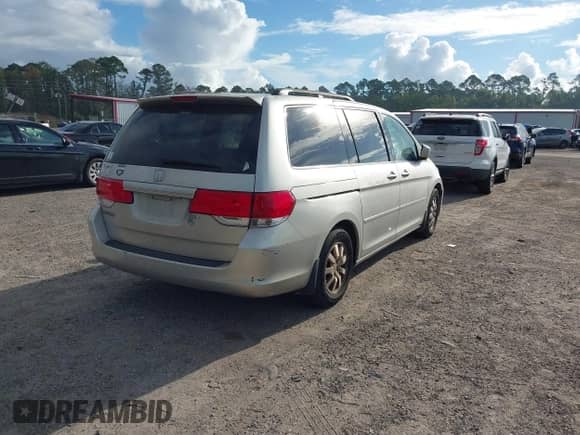 2008 Honda Odyssey EX-L with VIN 5FNRL38608B104137, listed as a IAAI auction lot 43284315 with 235,377 mi miles and . Bid and sale history available at DreamBid. Image 4.