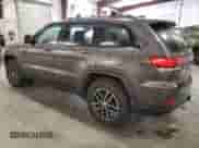 2017 Jeep Grand Cherokee Trailhawk z VIN 1C4RJFLG0HC610281, wystawiony jako Copart lot #82325495 z przebiegiem 140 671 mil mil oraz Czysty tytuł • Clean title. Historia ofert i sprzedaży dostępna na DreamBid. Obrazek 2.