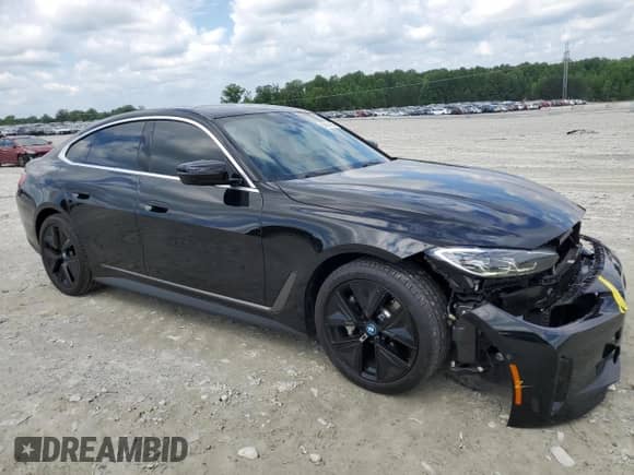 2023 BMW i4 eDrive40 с VIN WBY73AW03PFR43461, выставлен на аукционе Copart как лот 56274855 с пробегом 22 858 миль миль и Списание • Salvage title. История ставок и продаж доступна на DreamBid. Изображение 4.
