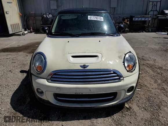 2013 MINI Hardtop with VIN WMWSU3C52DT680782, listed as a Copart auction lot 61779515 with 94,378 mi miles and Salvage title. Bid and sale history available at DreamBid. Image 5.