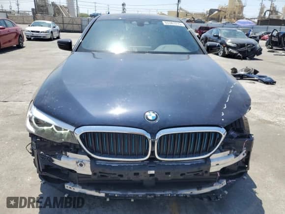 2020 BMW 5 Series 530e с VIN WBAJA9C02LCD11756, выставлен на аукционе Copart как лот 65387275 с пробегом 80 421 миль миль и Списание • Salvage title. История ставок и продаж доступна на DreamBid. Изображение 5.