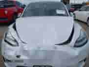 2021 Tesla Model Y Long Range with VIN 5YJYGDEE0MF095080, listed as a IAAI auction lot 42931169 with Not provided miles and . Bid and sale history available at DreamBid. Image 11.