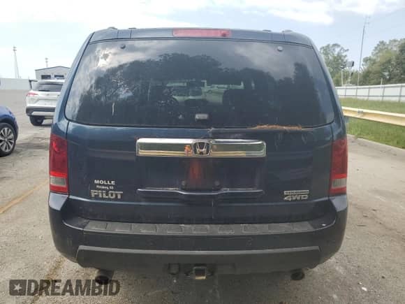 2009 Honda Pilot Touring with VIN 5FNYF48999B016322, listed as a Copart auction lot 71404925 with 205,468 mi miles and Salvage title. Bid and sale history available at DreamBid. Image 6.