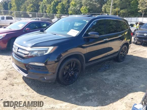 2016 Honda Pilot Touring z VIN 5FNYF5H9XGB007437, wystawiony jako IAAI lot #43208520 z przebiegiem 235 207 mil mil oraz . Historia ofert i sprzedaży dostępna na DreamBid. Obrazek 2.
