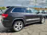 2011 Jeep Grand Cherokee Overland Summit with VIN 1J4RR6GT6BC701489, listed as a Copart auction lot 70597915 with 227,976 mi miles and Salvage title. Bid and sale history available at DreamBid. Image 3.