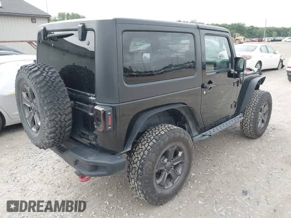 2018 Jeep Wrangler Rubicon Recon with VIN 1C4BJWCG6JL814834, listed as a IAAI auction lot 42327297 with 59,623 mi miles and . Bid and sale history available at DreamBid. Image 4.