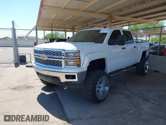 2014 Chevrolet Silverado 1500 LT z VIN 3GCUKREC8EG257977, wystawiony jako IAAI lot #42699776 z przebiegiem 132 224 mil mil oraz . Historia ofert i sprzedaży dostępna na DreamBid. Obrazek 6.