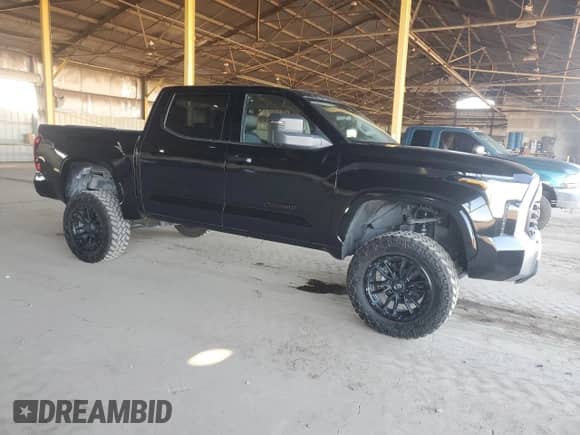 2023 Toyota Tundra SR5 with VIN 5TFLA5DB0PX064186, listed as a Copart auction lot 90465975 with 27,663 mi miles and Salvage title. Bid and sale history available at DreamBid. Image 4.