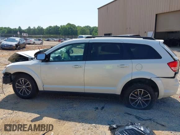 2018 Dodge Journey SE with VIN 3C4PDCABXJT448934, listed as a IAAI auction lot 42614601 with Not provided miles and . Bid and sale history available at DreamBid. Image 14.