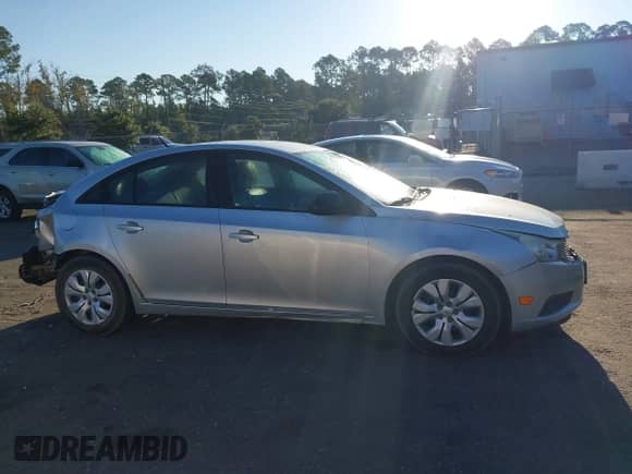 2013 Chevrolet Cruze LS with VIN 1G1PB5SG1D7140130, listed as a IAAI auction lot 43148418 with 97,790 mi miles and . Bid and sale history available at DreamBid. Image 13.