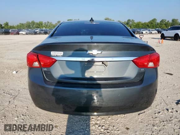 2019 Chevrolet Impala LT with VIN 2G11Z5S30K9134667, listed as a Copart auction lot 70410515 with 128,579 mi miles and Salvage title. Bid and sale history available at DreamBid. Image 6.